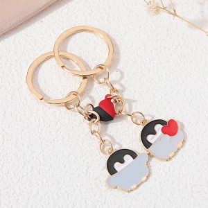 Pareja llaveros pingüinos